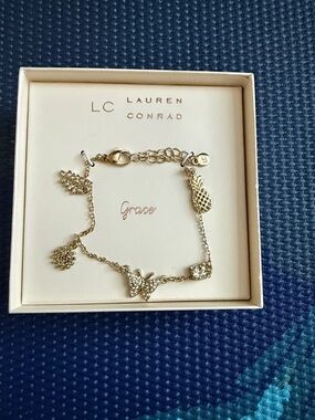 LC Lauren Conrad Gold Charm Bracelet with Butterfly, Pineapple & Floral Charms